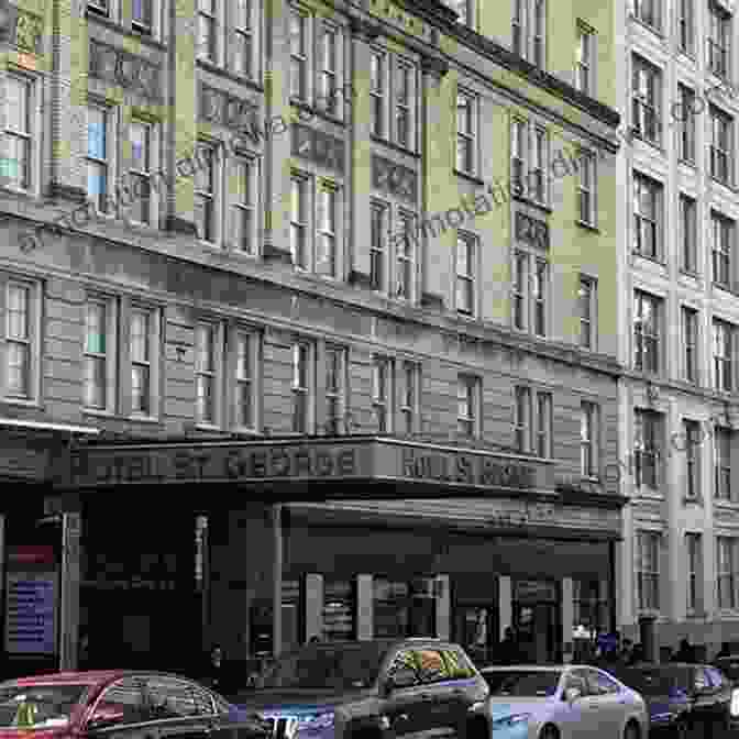 The Grand Facade Of The Hotel St. George, Showcasing Its Intricate Architectural Details And Historic Charm. Saving The Hotel St George